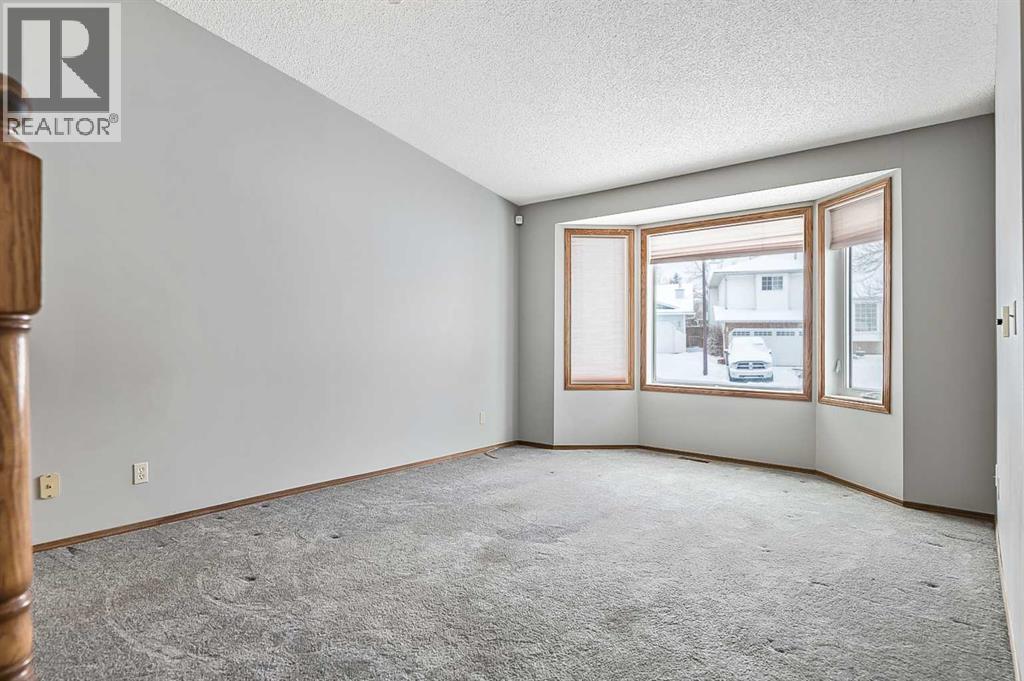 104 Macewan Meadow Way Nw, Calgary, Alberta  T3K 3H8 - Photo 7 - A2273932