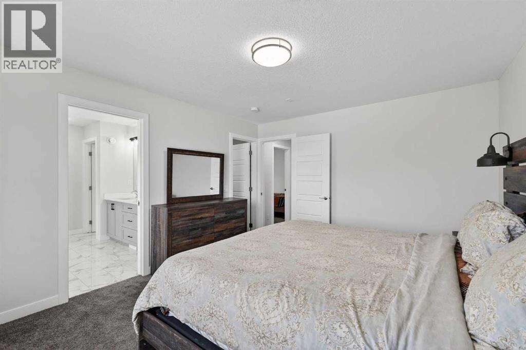 15 Midgrove Drive Sw, Airdrie, Alberta  T4B 5H1 - Photo 26 - A2283162