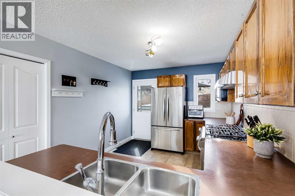 197 Stonegate Drive Nw, Airdrie, Alberta  T4B 3A2 - Photo 8 - A2288735