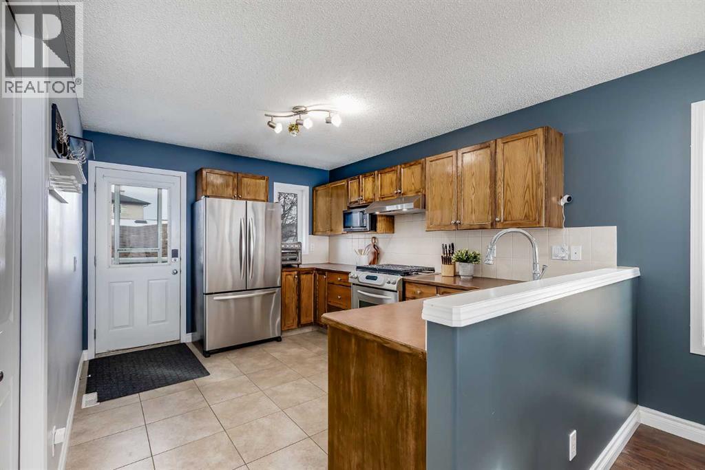 197 Stonegate Drive Nw, Airdrie, Alberta  T4B 3A2 - Photo 7 - A2288735