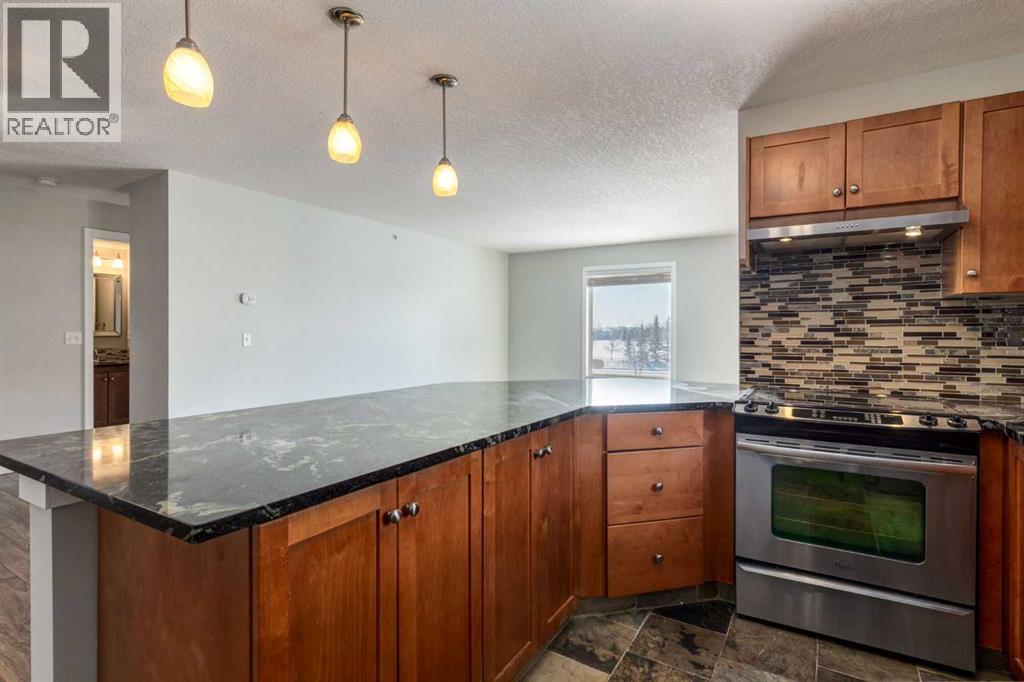 2301, 2518 Fish Creek Boulevard Sw, Calgary, Alberta  T2Y 4T5 - Photo 9 - A2289648