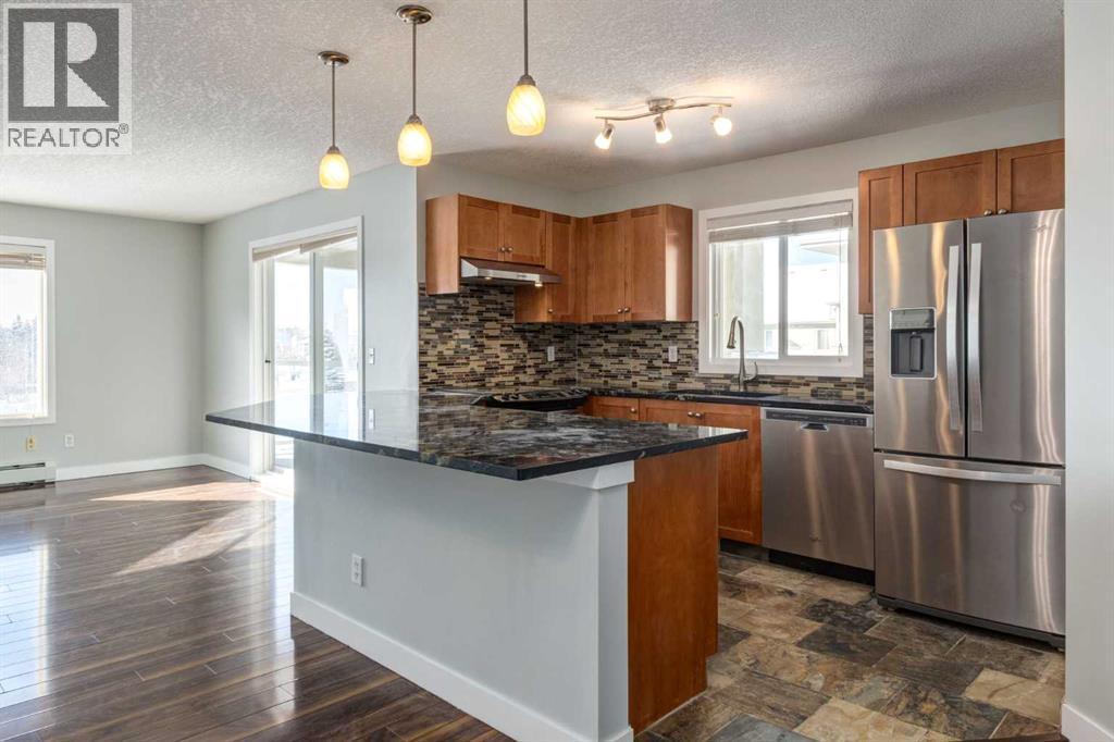 2301, 2518 Fish Creek Boulevard Sw, Calgary, Alberta  T2Y 4T5 - Photo 3 - A2289648