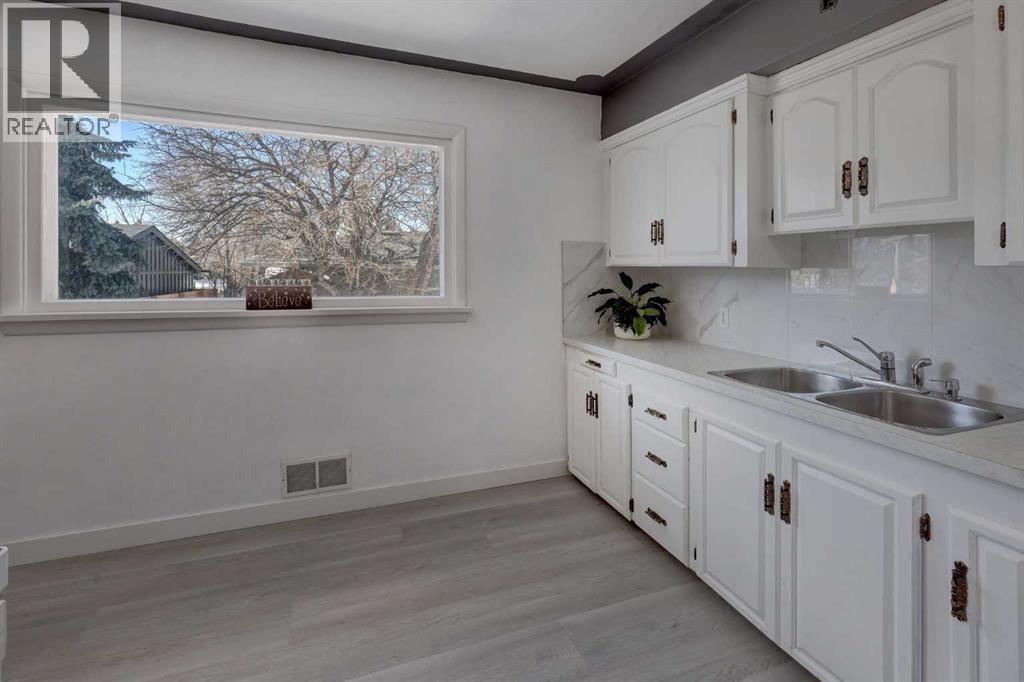 1307 Windsor Street Nw, Calgary, Alberta  T2N 3X2 - Photo 9 - A2289667