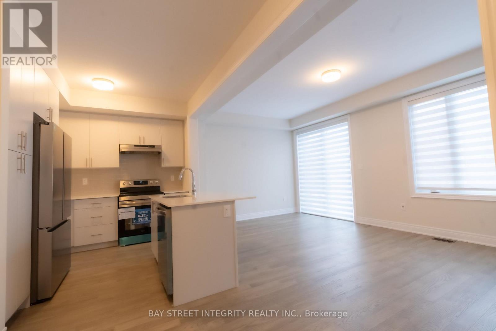 11 - 2184 Postmaster Drive, Oakville, Ontario  L6M 5T1 - Photo 4 - W12832354