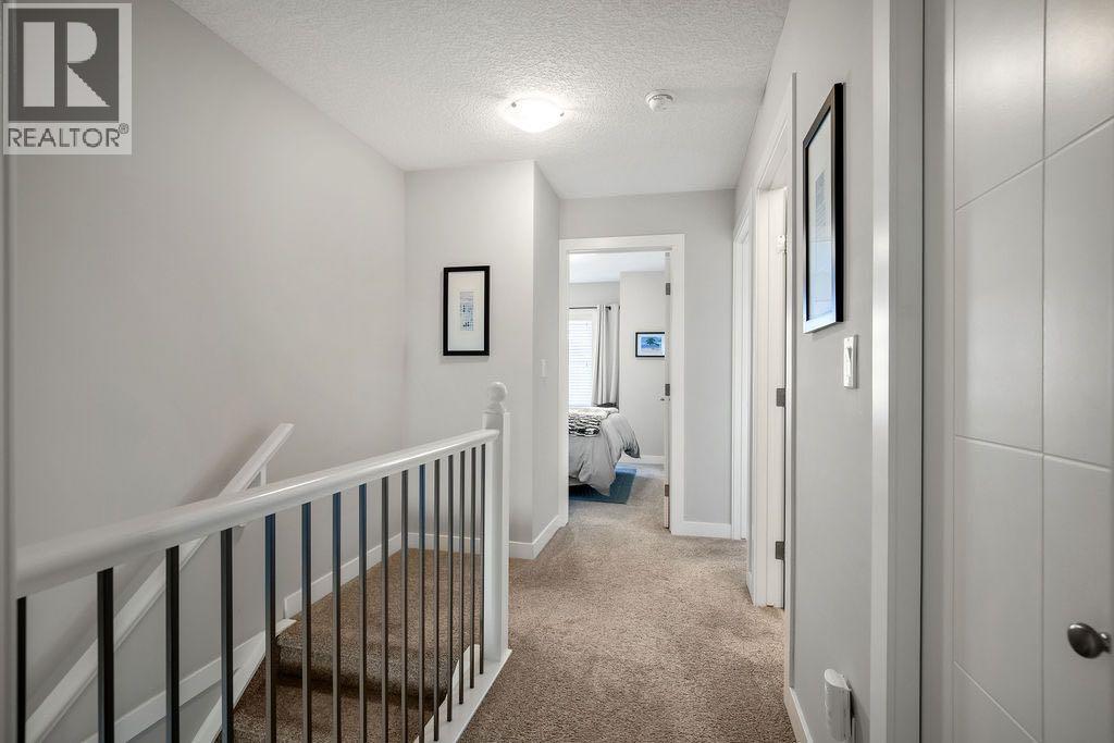 703, 501 River Heights Drive, Cochrane, Alberta T4C 2L3 - Photo 21 - A2281117