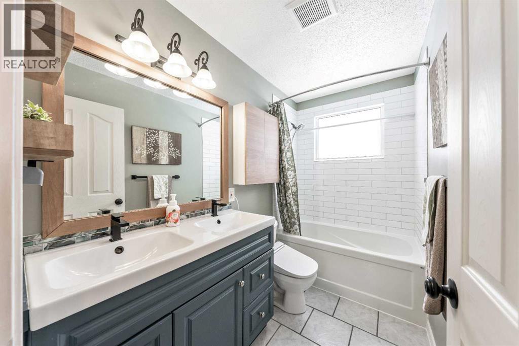 804 68 Avenue Nw, Calgary, Alberta T2K 0N1 - Photo 17 - A2289620