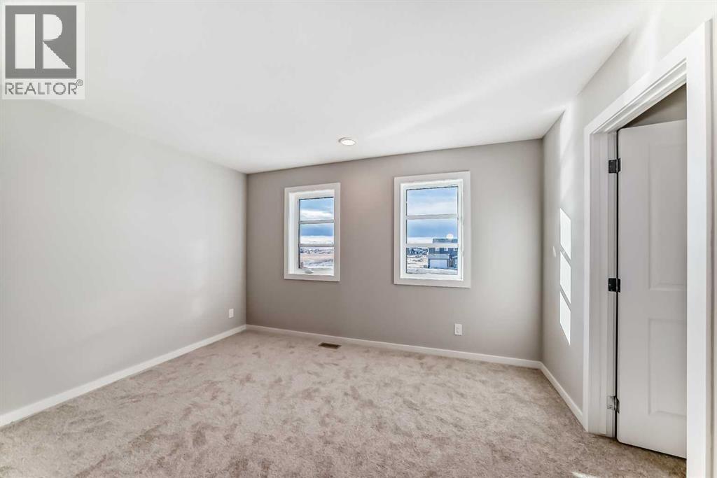 96 Creekside Rise Sw, Calgary, Alberta  T2X 6G8 - Photo 23 - A2289488