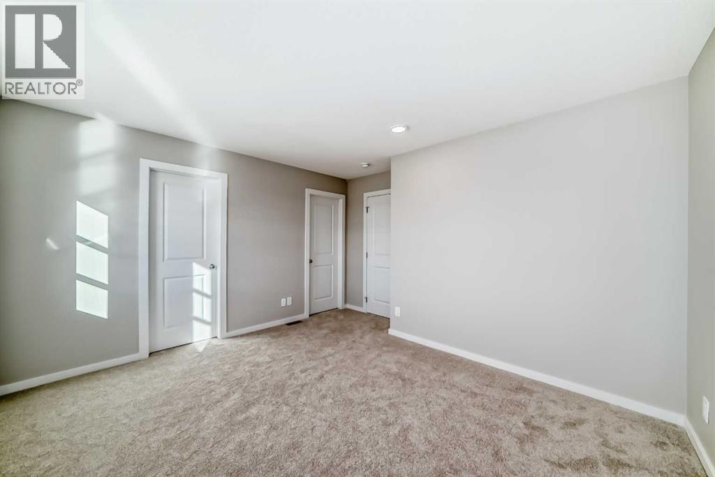 96 Creekside Rise Sw, Calgary, Alberta  T2X 6G8 - Photo 25 - A2289488