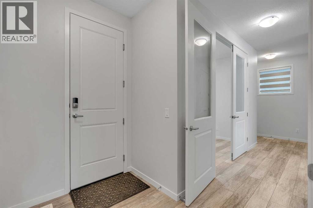 20 Rowley Common Nw, Calgary, Alberta  T3L 0H8 - Photo 5 - A2276263