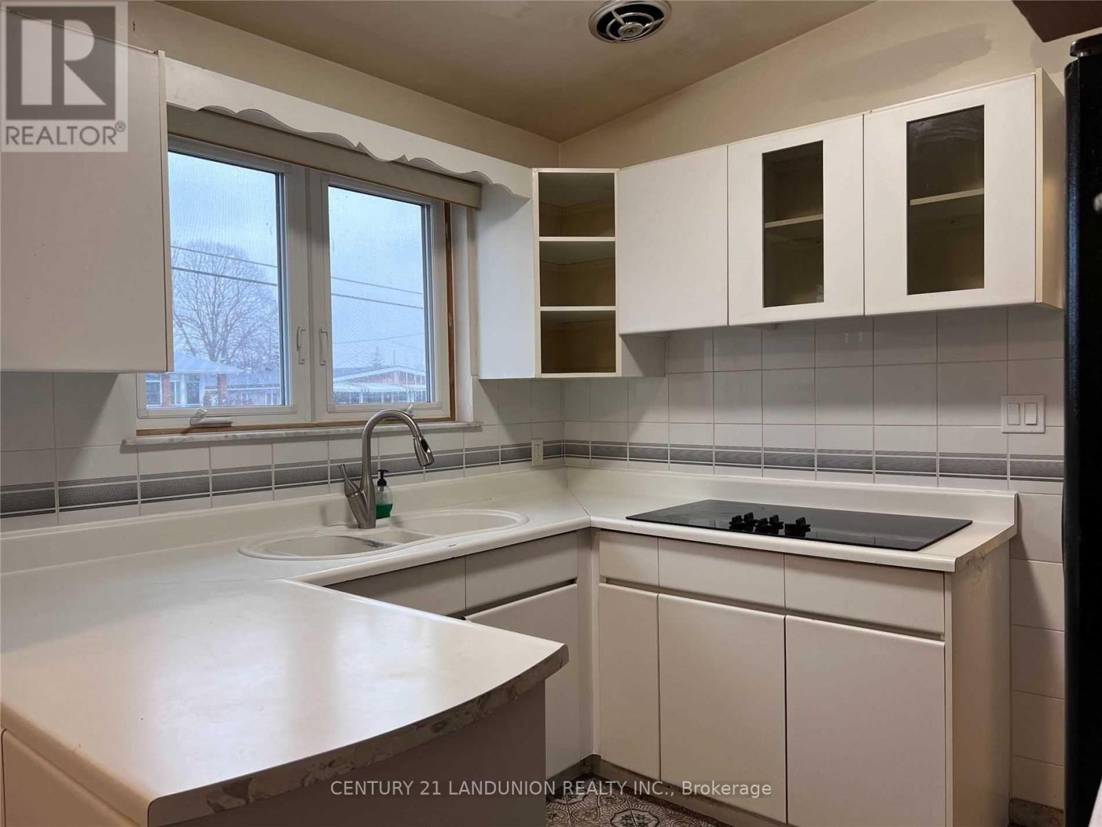 1 Brady Crescent, Toronto, Ontario  M3L 2B6 - Photo 3 - W12834264