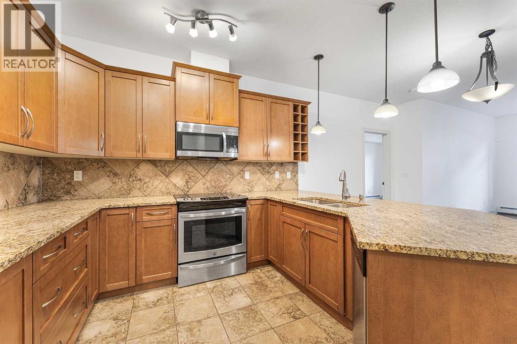 223, 35 Aspenmont Heights Sw, Calgary, Alberta T3H 0E5 - Photo 4 - A2282239