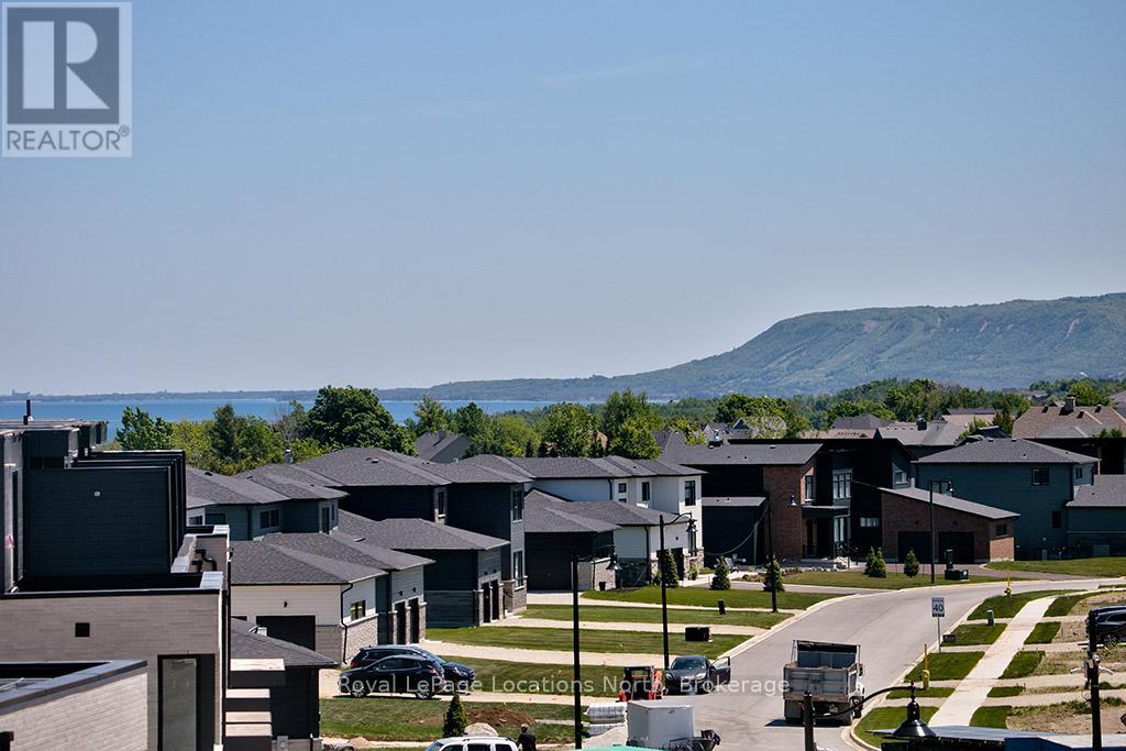 18 - 117 Sladden Court, Blue Mountains, Ontario  N0H 2P0 - Photo 3 - X12834696