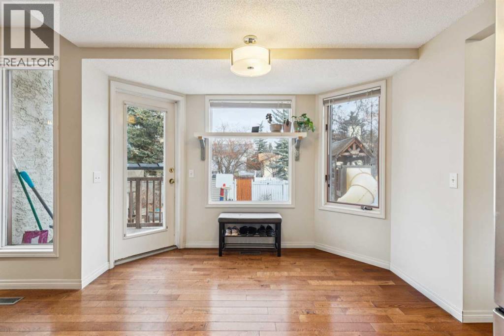 124 Woodmark Crescent Sw, Calgary, Alberta  T2W 4Z2 - Photo 5 - A2281355