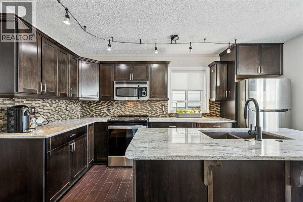 22 Hunterhorn Crescent Ne, Calgary, Alberta  T2K 6J4 - Photo 10 - A2289065