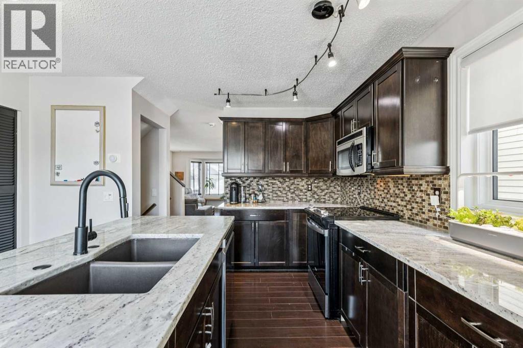 22 Hunterhorn Crescent Ne, Calgary, Alberta  T2K 6J4 - Photo 12 - A2289065