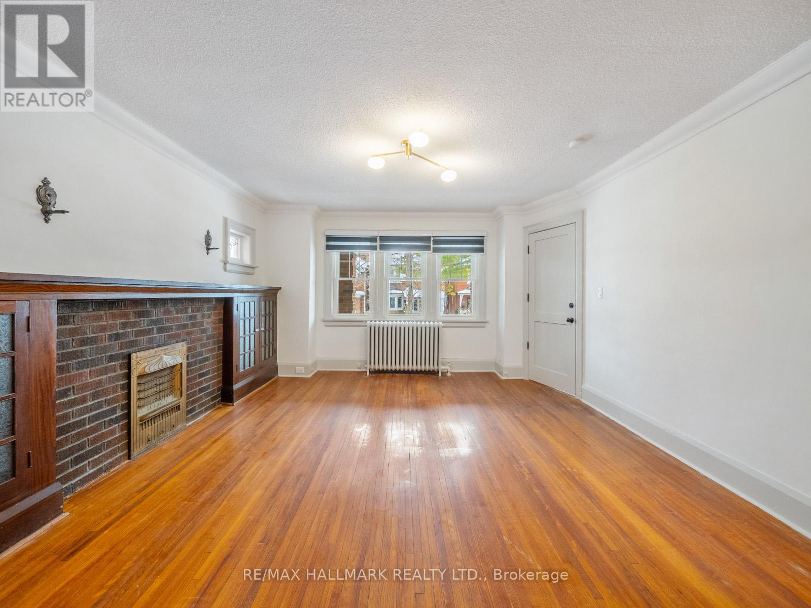 42 Glen Manor Drive, Toronto, Ontario  M4E 2X2 - Photo 8 - E12835146