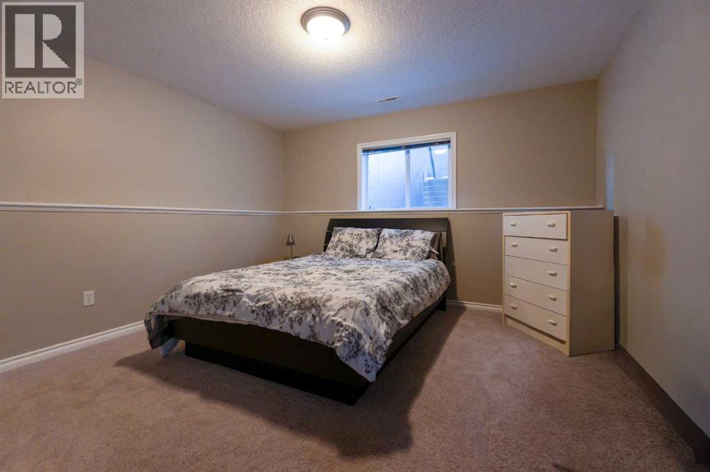 65 Heritage Circle W, Lethbridge, Alberta  T1K 7T3 - Photo 41 - A2289412