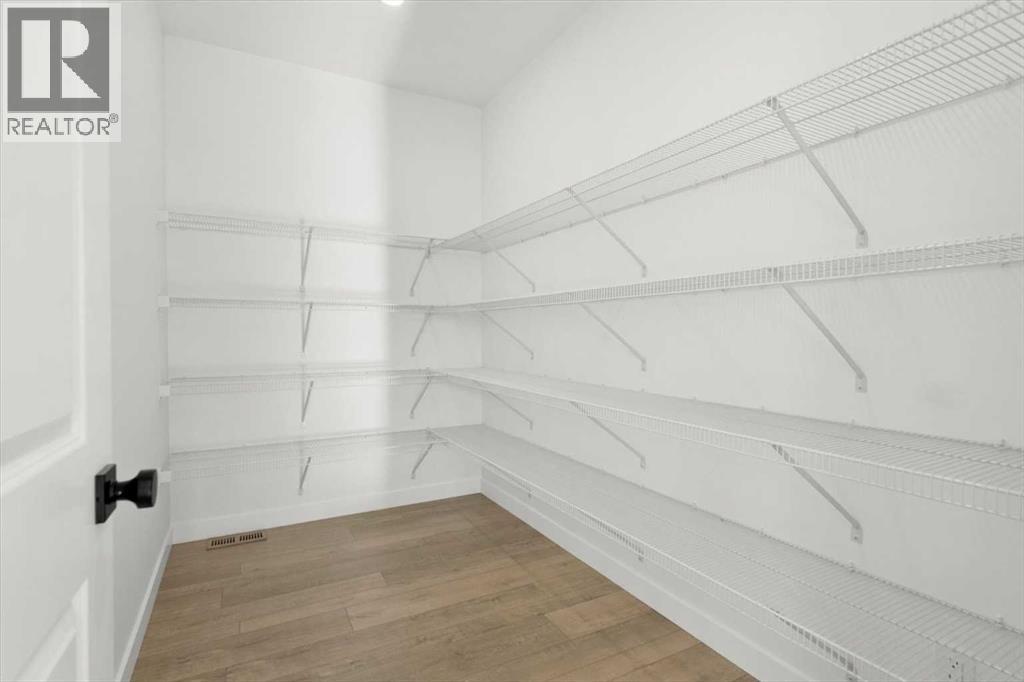 207 Perch Bend, Rural Rocky View County, Alberta  T3Z 0J9 - Photo 19 - A2263864