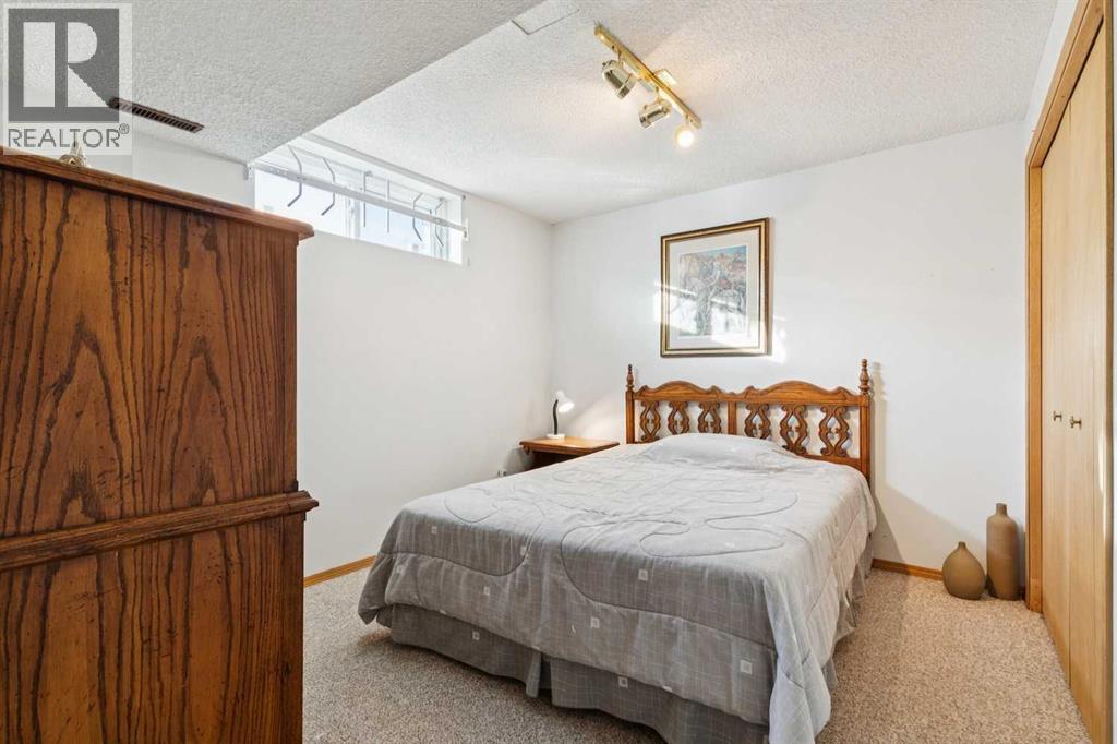 181 Woodford Drive Sw, Calgary, Alberta  T2W 4C2 - Photo 34 - A2277176