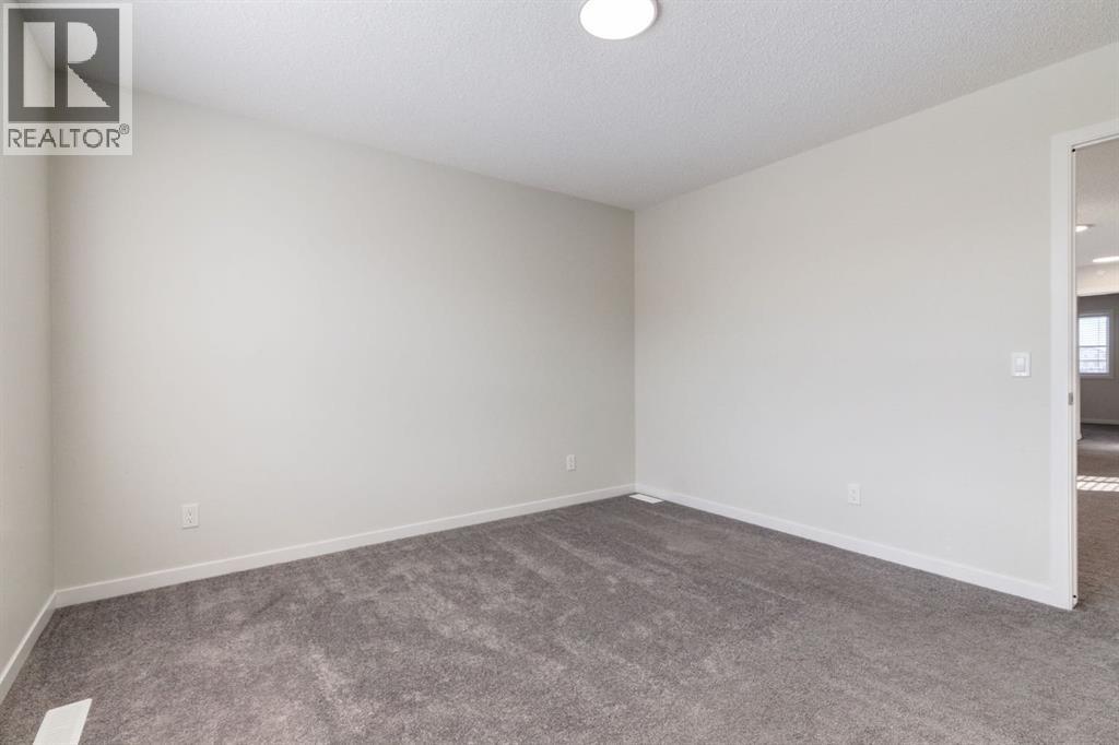 128 Hotchkiss Gate Se, Calgary, Alberta  T3S 0G1 - Photo 25 - A2289360