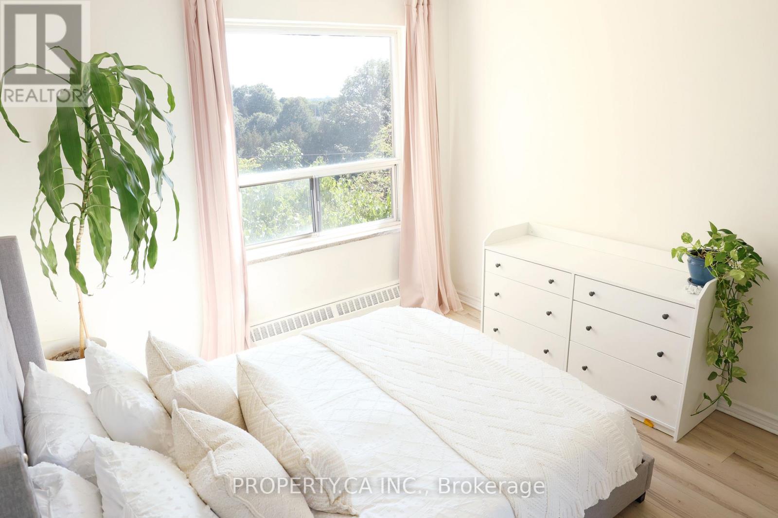 303 - 60 Gulliver Road, Toronto, Ontario  M6M 2M6 - Photo 19 - W12836276