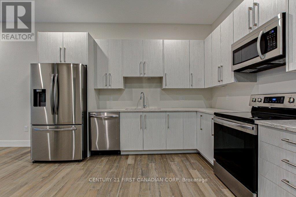 201 - 1696 Fiddlehead Place, London North, Ontario  N6G 2V7 - Photo 3 - X12836474