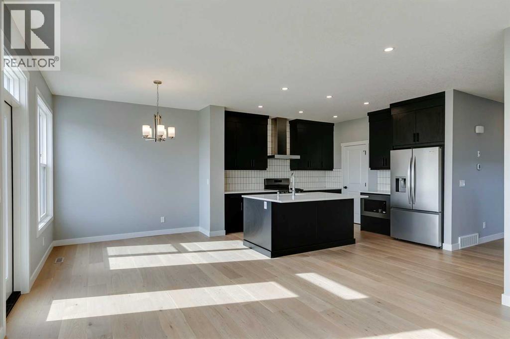 23 Creekstone Green Sw, Calgary, Alberta  T2X 6H6 - Photo 7 - A2284177