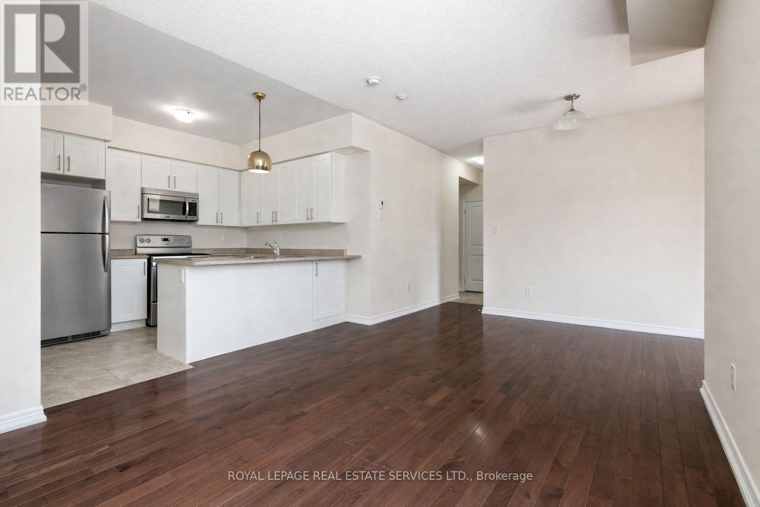 206 - 2326 Taunton Road, Oakville, Ontario  L6H 0G3 - Photo 5 - W12836454