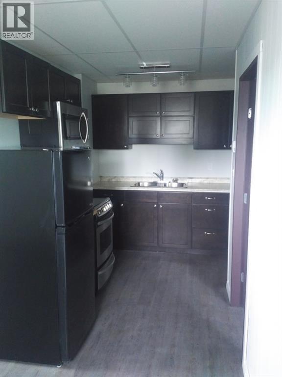 501 & 509 Main Street, Falher, Alberta t0h 1m0 - Photo 8 - A1079650