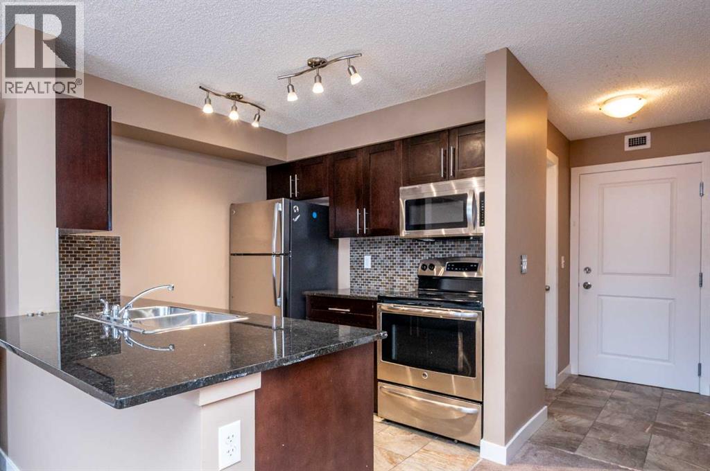 8206, 403 Mackenzie Way Sw, Airdrie, Alberta  T4B 3V7 - Photo 6 - A2289815