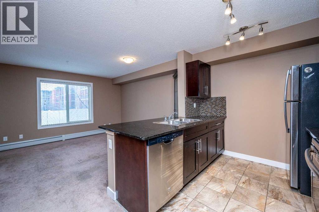 8206, 403 Mackenzie Way Sw, Airdrie, Alberta  T4B 3V7 - Photo 11 - A2289815