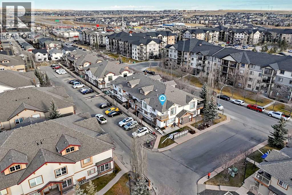 205, 20 Panatella Landing Nw, Calgary, Alberta T3K 0K8 - Photo 2 - A2270242