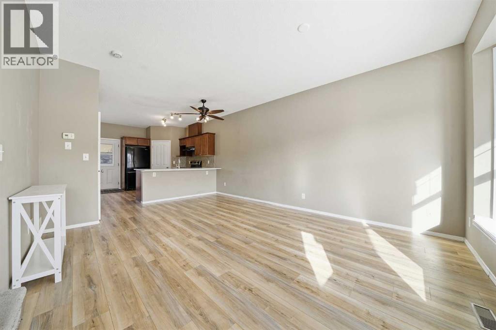 103, 2066 Luxstone Boulevard Sw, Airdrie, Alberta  T4B 0L1 - Photo 3 - A2283886