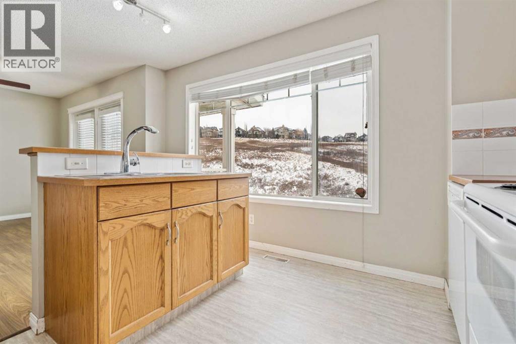 157 Hidden Creek Gardens Nw, Calgary, Alberta  T3A 6J4 - Photo 9 - A2276185