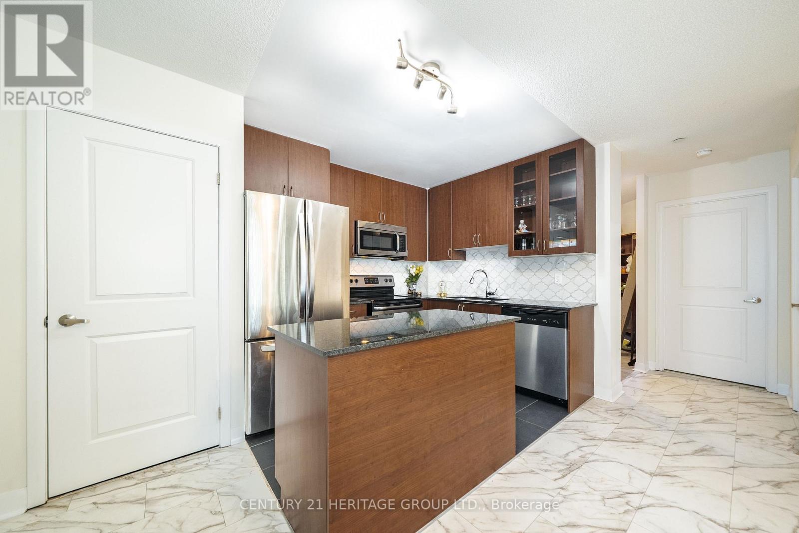 101 - 75 Norman Bethune Avenue, Richmond Hill, Ontario  L4B 0B6 - Photo 6 - N12836778