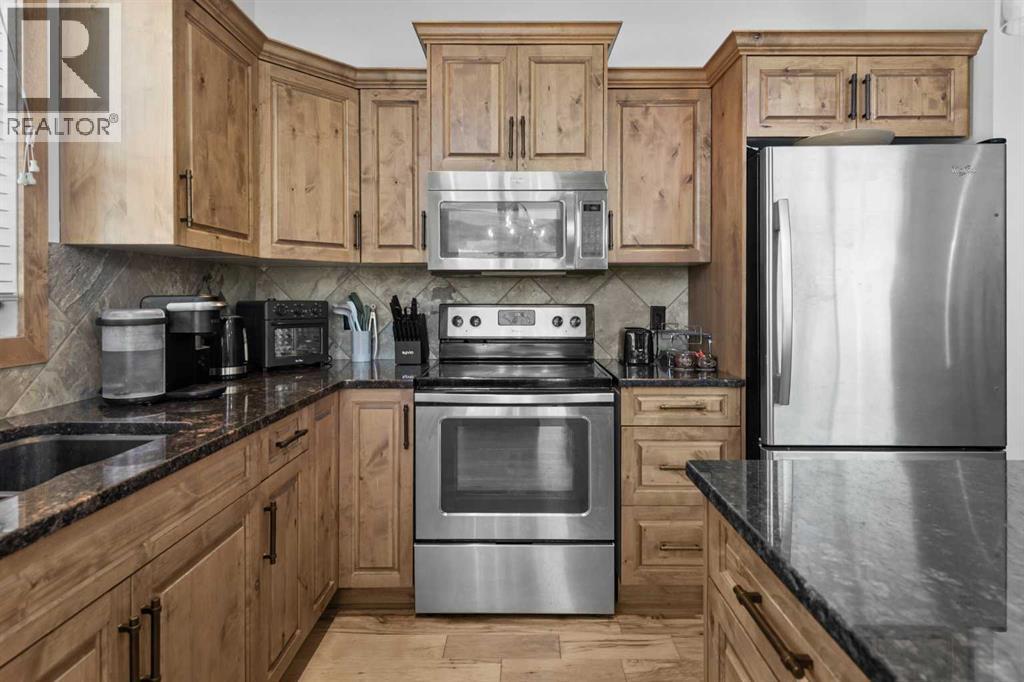 503 Cottageclub Bay, Rural Rocky View County, Alberta  T4C 1B1 - Photo 10 - A2287380