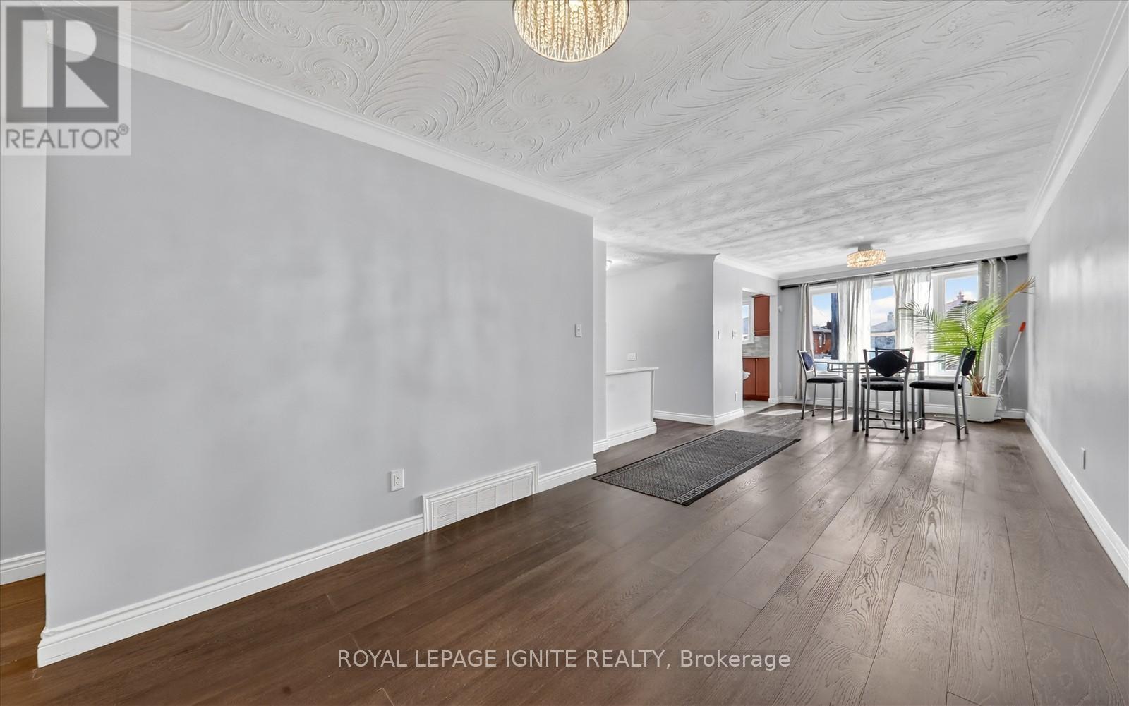 12 Kanarick Crescent, Toronto, Ontario  M3L 1P4 - Photo 3 - W12837150