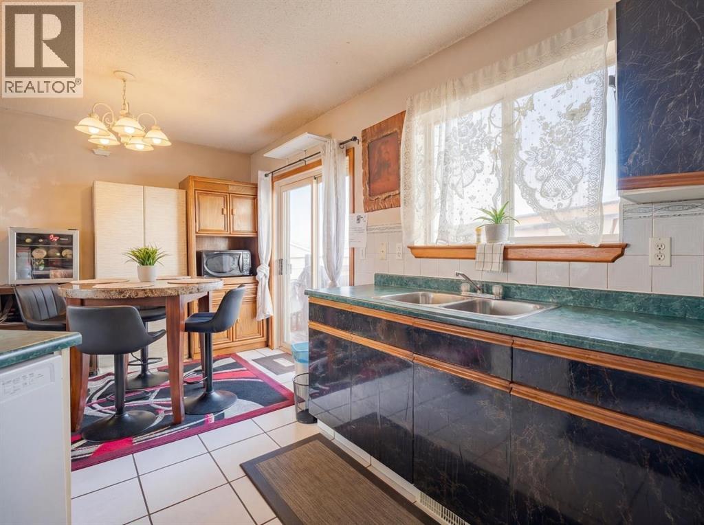 206 Saratoga Close Ne, Calgary, Alberta  T1Y 7A1 - Photo 8 - A2287199