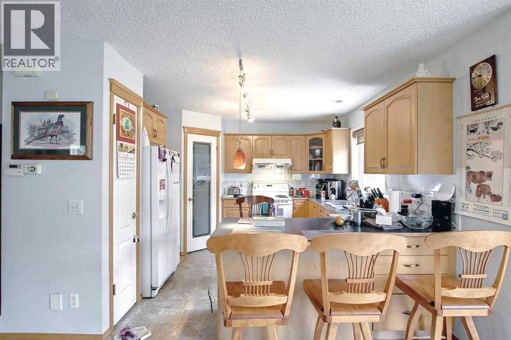 10661 Hidden Valley Drive Nw, Calgary, Alberta  T3A 5V3 - Photo 4 - A2286648