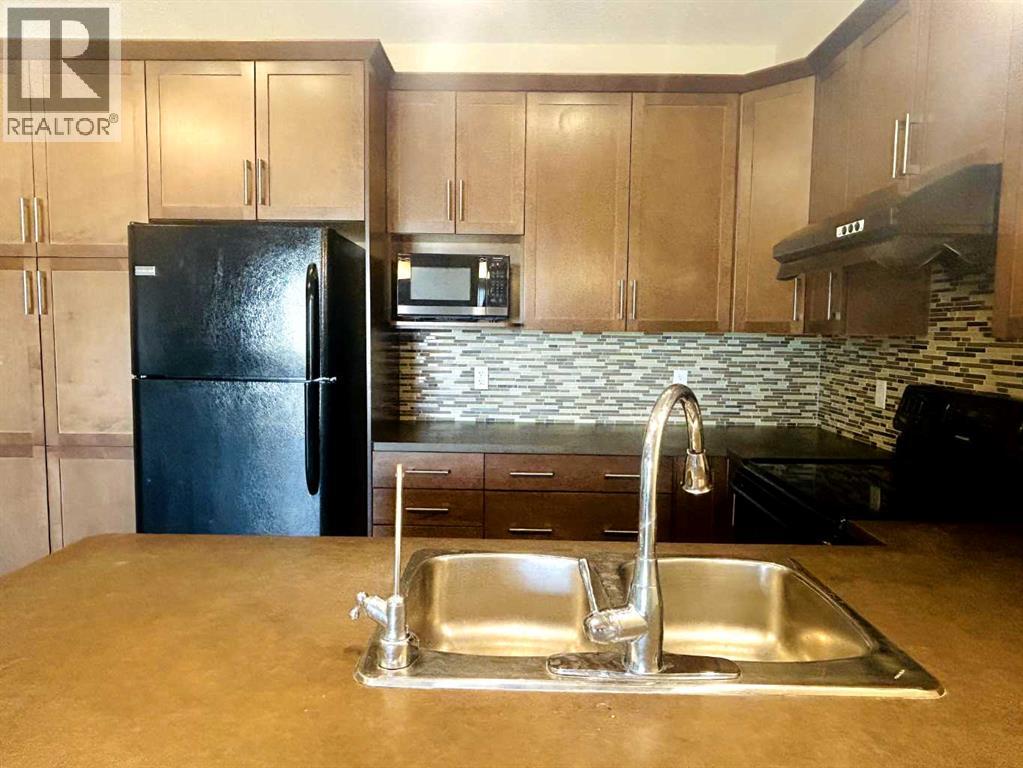 2418, 175 Panatella Hill Nw, Calgary, Alberta  T3K 0V9 - Photo 3 - A2284775