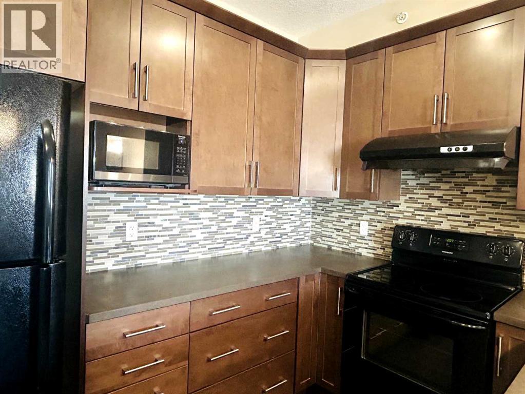 2418, 175 Panatella Hill Nw, Calgary, Alberta  T3K 0V9 - Photo 4 - A2284775