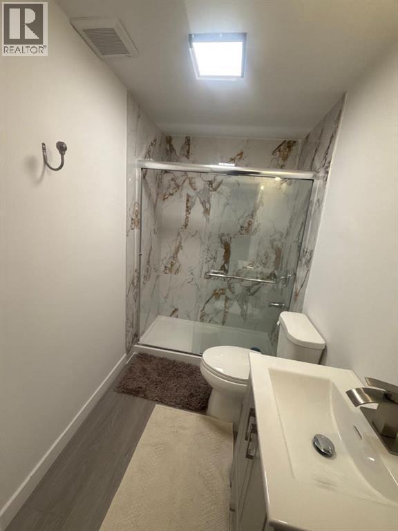 7212 Sierra Morena Boulevard Sw, Calgary, Alberta  T3H 3G5 - Photo 25 - A2275192