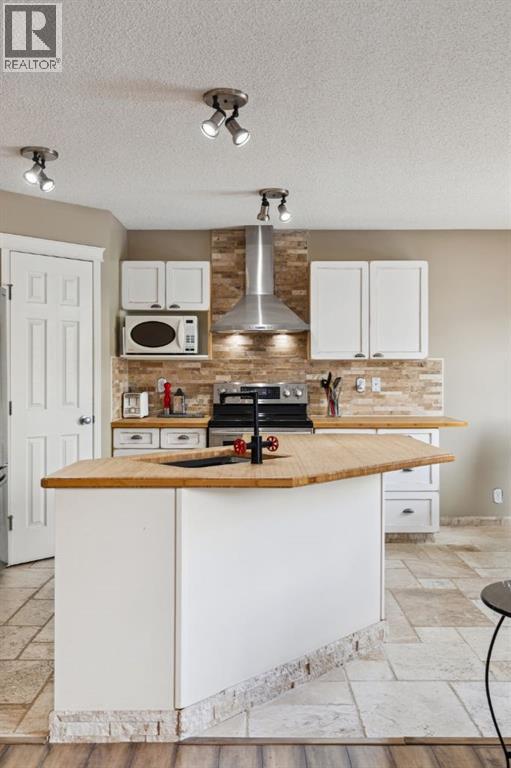 40 Shannon Gardens Sw, Calgary, Alberta  T2Y 4L7 - Photo 17 - A2289743