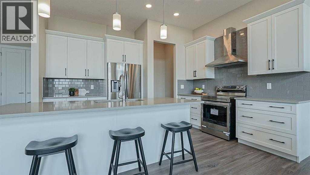 803 Hampshire Bay Ne, High River, Alberta  T1V 0E5 - Photo 3 - A2278683