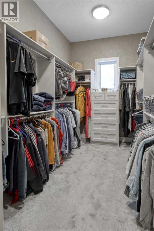 406 Hawk's Nest Grove, Priddis Greens, Alberta  T0L 1W3 - Photo 31 - A2289942