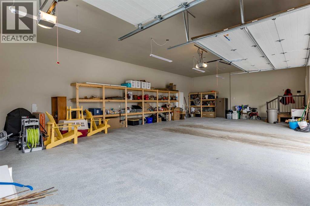 406 Hawk's Nest Grove, Priddis Greens, Alberta  T0L 1W3 - Photo 27 - A2289942