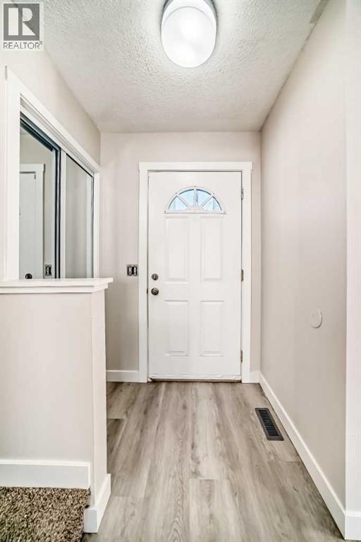 120 Martinview Close Ne, Calgary, Alberta  T3J 2R8 - Photo 4 - A2276775