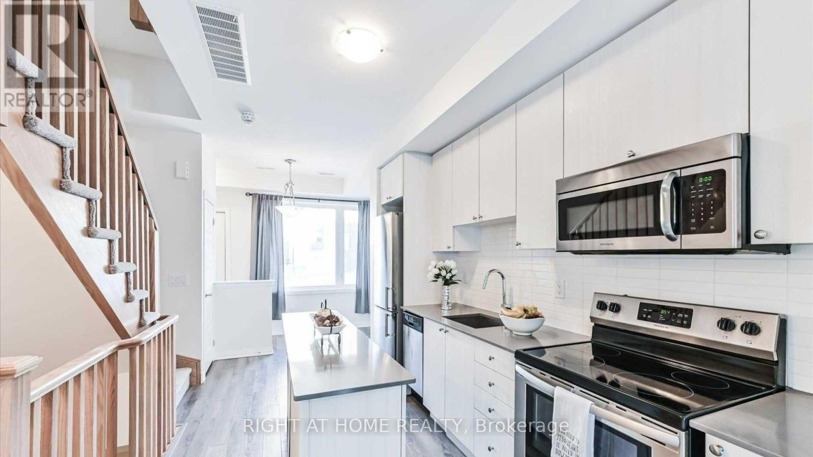 19 Thomas Mulholland Drive, Toronto, Ontario  M3K 0B5 - Photo 4 - W12838676