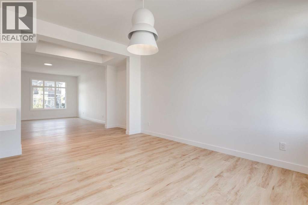 201 Tillotson Drive, Okotoks, Alberta  T1S 4Z5 - Photo 5 - A2274232