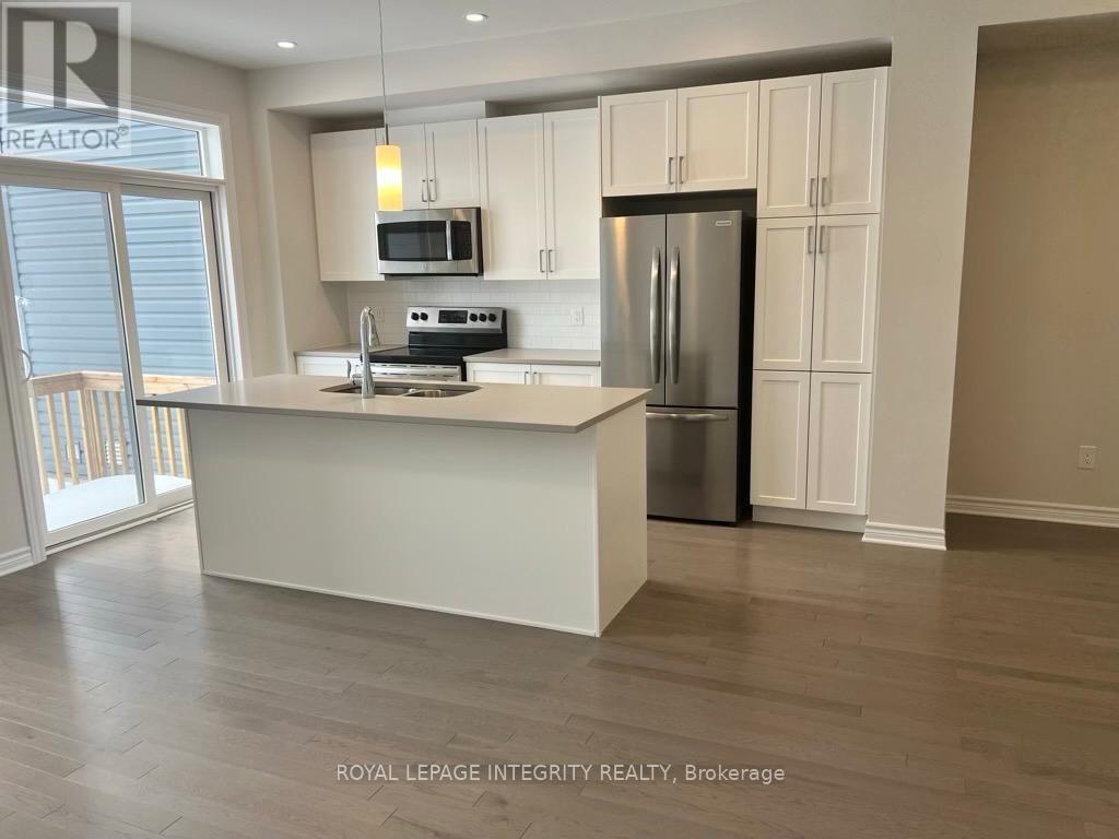 504 Enclave Lane, Clarence-Rockland, Ontario  K4K 0M8 - Photo 2 - X12828954